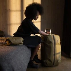 Thule Aion 28" Check-In Wheeled Duffel - Water-Resistant Waxed Canvas Travel Suitcase -Luggage Pros Store Thule Luggage Aion 28 Check In Wheeled Duffel 16